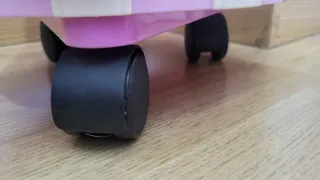 Carrito transportín peluche Reina Disney.