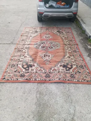 Alfombra estilo oriental naranja y rosa