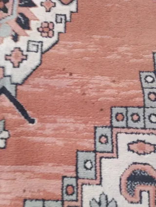 Alfombra estilo oriental naranja y rosa