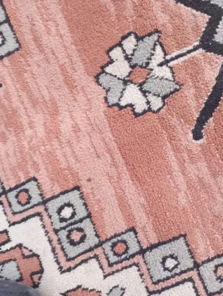 Alfombra estilo oriental naranja y rosa