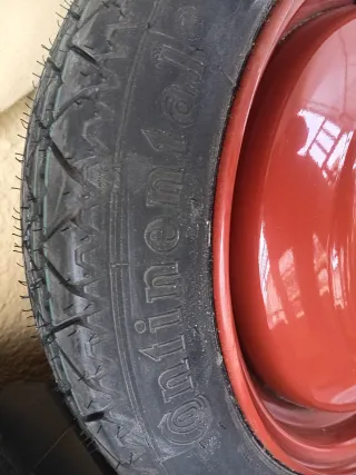 Rueda de repuesto + gato + kit