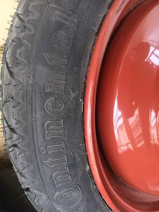 Rueda de repuesto + gato + kit