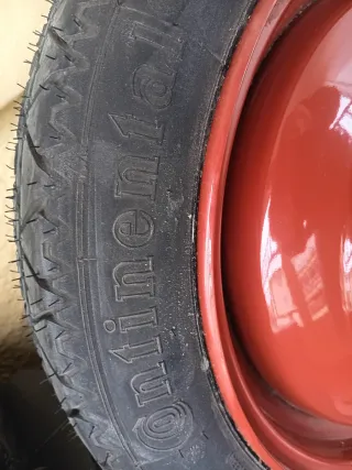 Rueda de repuesto + gato + kit