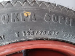 Rueda de repuesto + gato + kit