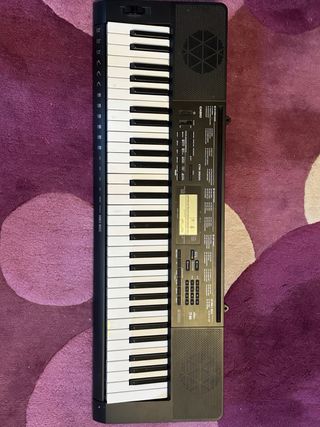 Piano Eléctrico Casio con Soporte y Banqueta