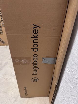 Bugaboo Donkey Gemelar con sillas y capazos.