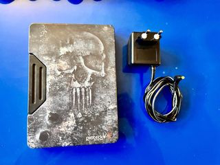 PS3 300GB + 2 mandos + 4 juegos + cargador mandos