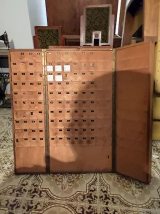 Orologio da parete antico in legno