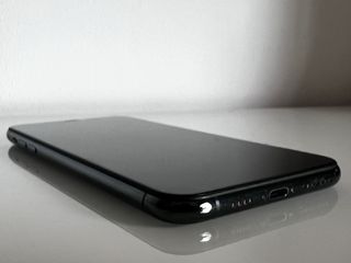 iPhone 11 Pro Max con custodia protettiva impeccabile