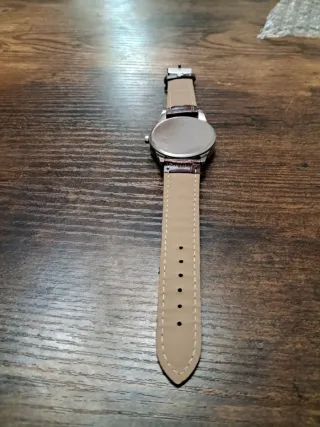 Reloj de pulsera azul y marrón