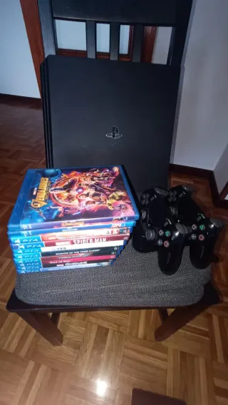 PS4 Pro (limpia) 1 TB + 2 mandos + juegos