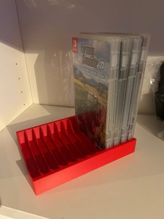 Supporto porta giochi Nintendo Switch rosso