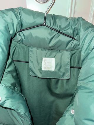 Plumas verde acolchada