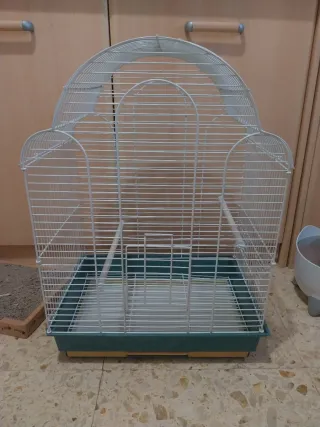 Jaula para pájaros blanca y verde