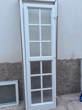 Puerta de aluminio de 1 hoja mas premarco