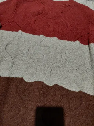 Maglione color block con trecce