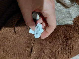 Maglione color block con trecce