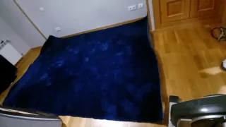 Elegante alfombra terciopelo azul