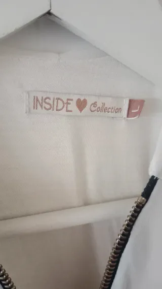 Blusa blanca INSIDE con cremallera dorada