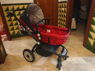 Cochecito de bebé rojo y negro