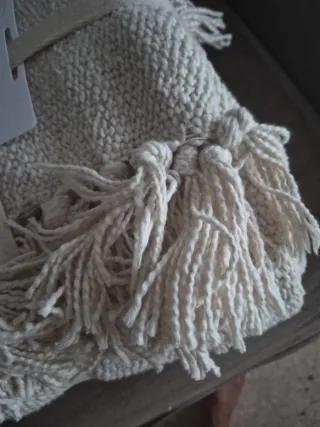Manta de algodón con flecos