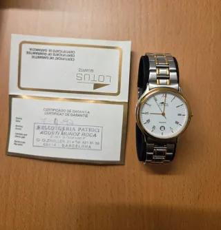 Reloj Lotus Oro y Plata