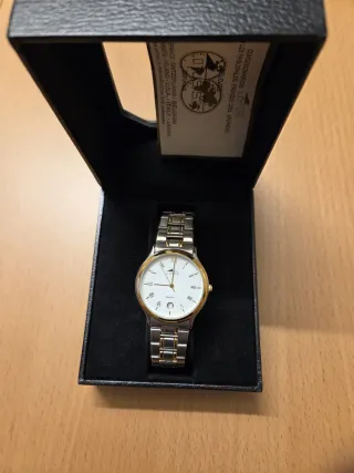 Reloj Lotus Oro y Plata