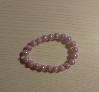 Pulsera de abalorios rosa perlado
