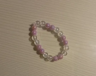 Pulsera de abalorios rosas y transparentes