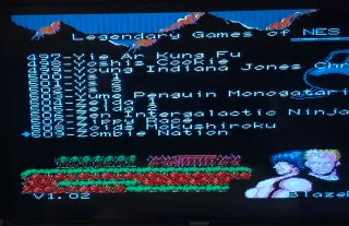 Nintendo NES más mandos y cartucho 509 juegos.