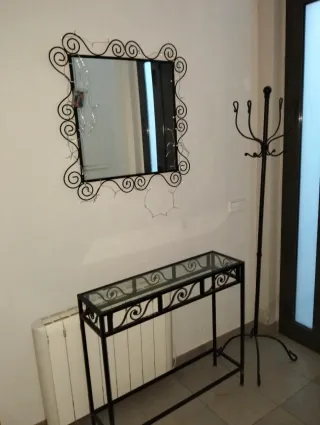 Mesa recibidor de hierro y cristal