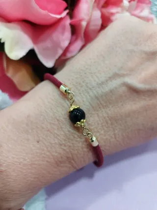 Braccialetto con su Coccu oro e rosso