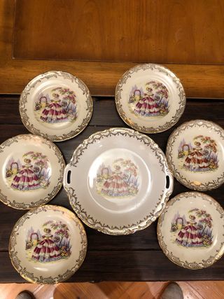 Fuente y 6 platos de porcelana dorada