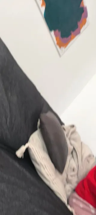 Zapatillas running Nike grises con logo  naranja