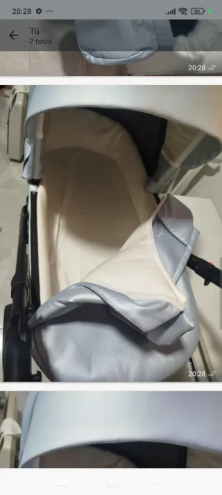 Carro de bebé azul con detalles dorados