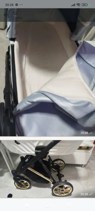 Carro de bebé azul con detalles dorados