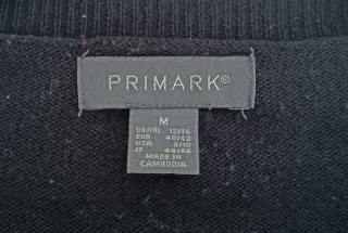 Jersey negro rayas blancas de cuello pico clásico