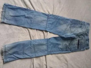 Pantalones vaqueros desgastados