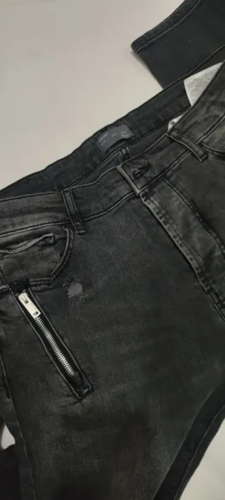 Pantalones vaqueros grises con cremallera talla 44