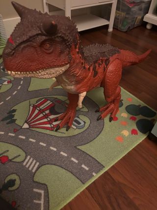 Dinosaurio de juguete grande