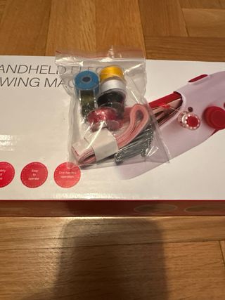 Máquina de coser eléctrica de mano
