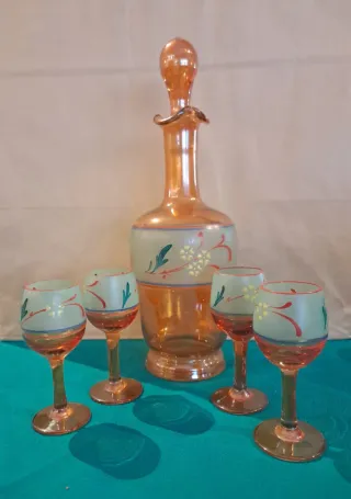 Caraffa e 4 bicchieri in vetro arancione
