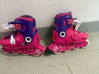 Patines niña y protecciones rosa/morado