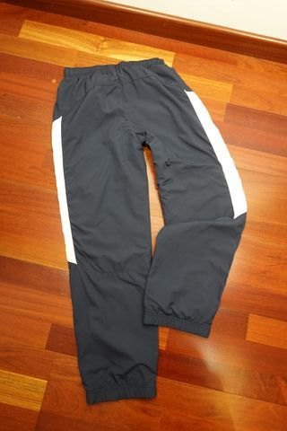 Pantalón Nike Azul Marino con Raya Blanca