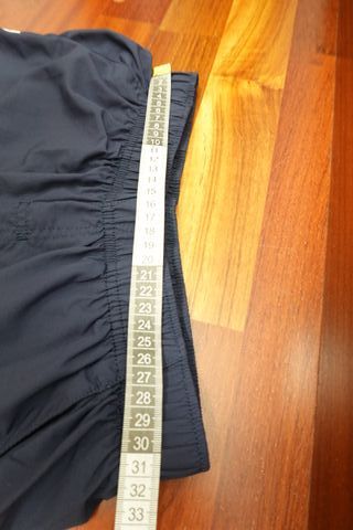 Pantalón Nike Azul Marino con Raya Blanca