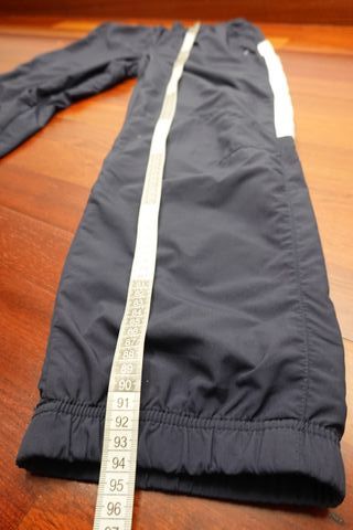 Pantalón Nike Azul Marino con Raya Blanca