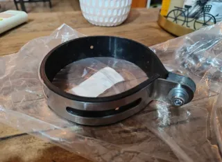 Abrazadera Escape 110-115mm