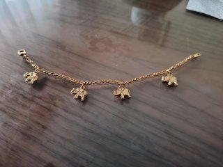 Pulseras doradas charms Indalo/elefantes suerte