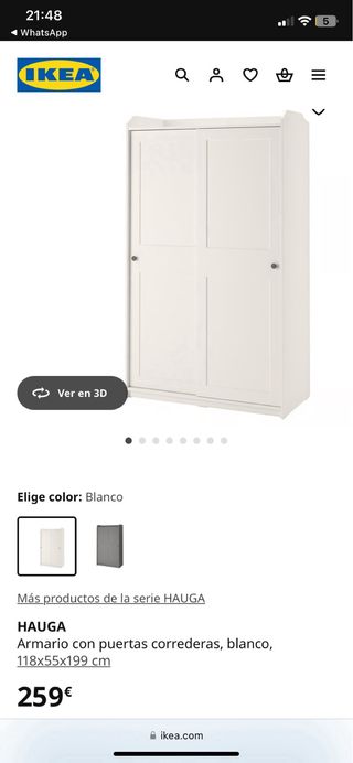 Armario blanco con puertas correderas.