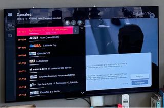 TV LG OLED48CX5LC con peana y soporte pared.